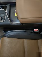 Front seat gap storage.jpg