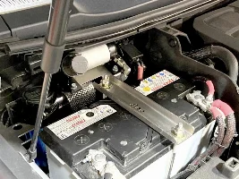 Mounting a compressor under the hood
