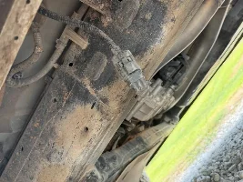 Plug under driver running board