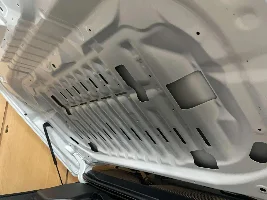 Hood Flutter Investigated and Corrected
