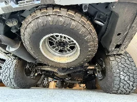 Has anyone fit a 35" spare tire under the GX550?