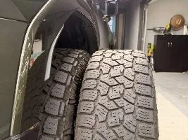 Largest AT tire that fits spare space of Premium+
