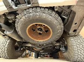 Has anyone fit a 35" spare tire under the GX550?