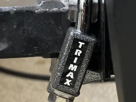 Locking hitch pin with matching coupler lock?