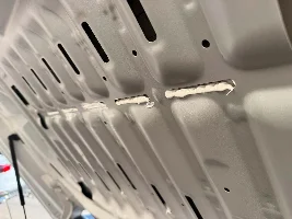 Hood Flutter Investigated and Corrected